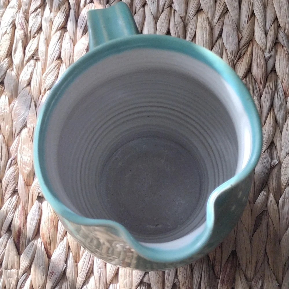 Karyn Tulla,  handmade turquoise fish  pottery vase